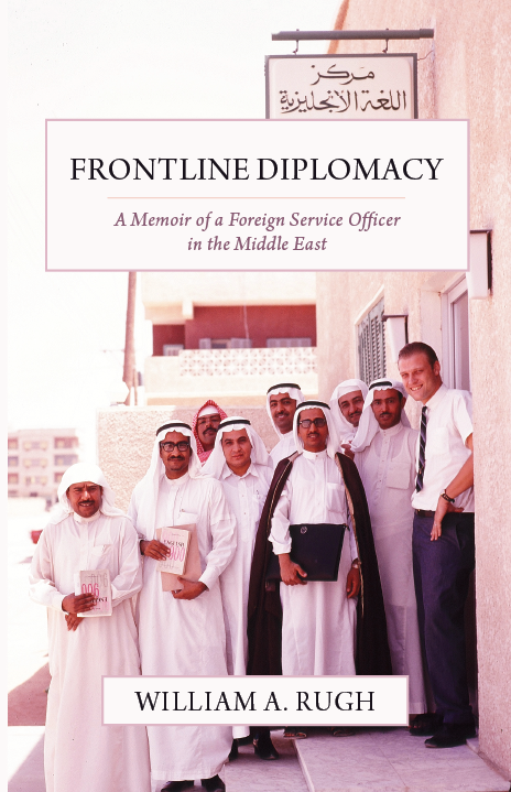 This is a photo of the cover of Frontline Diplomacy. It features the author and a group of people standing in front of a language learning school.